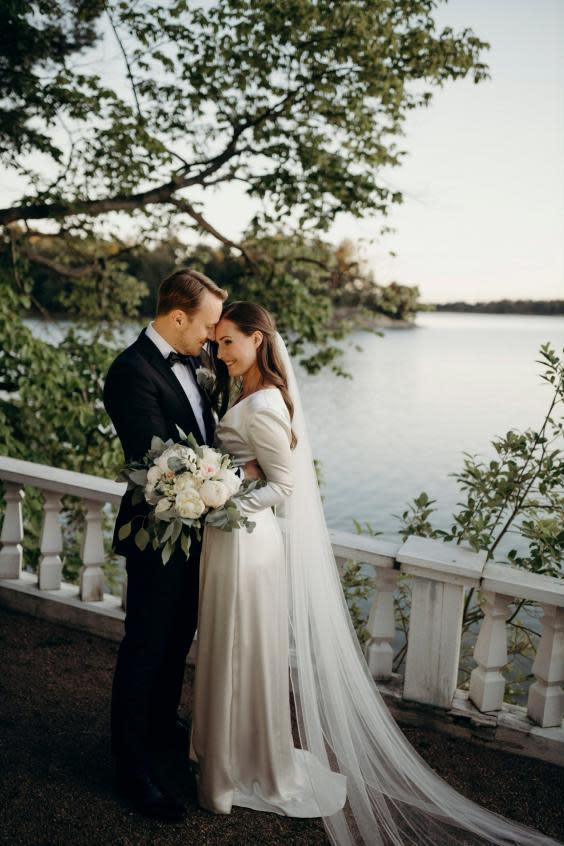 Finnish prime minister Sanna Marin and her new husband Markus Raikkonen after their wedding at the PM’s official residence Kesaranta in Helsinki, Finland (Minttu Saarni/Finnish Prime Minister’s Office via AP)