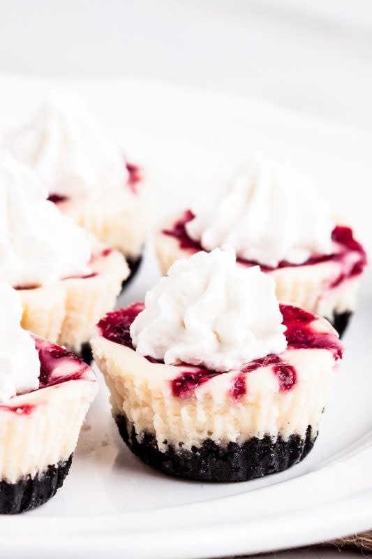 <p>Chew Out Loud</p><p>These cute little white chocolate raspberry cheesecake bites are just the right size for popping into your mouth. Creamy, smooth, rich, and decadent morsels worthy of any occasion.</p><p><strong>Get the recipe: <a href="https://www.chewoutloud.com/white-chocolate-raspberry-cheesecake-bites/" rel="nofollow noopener" target="_blank" data-ylk="slk:White Chocolate Raspberry Cheesecake Bites;elm:context_link;itc:0;sec:content-canvas" class="link rapid-noclick-resp">White Chocolate Raspberry Cheesecake Bit<em>es</em></a></strong></p>