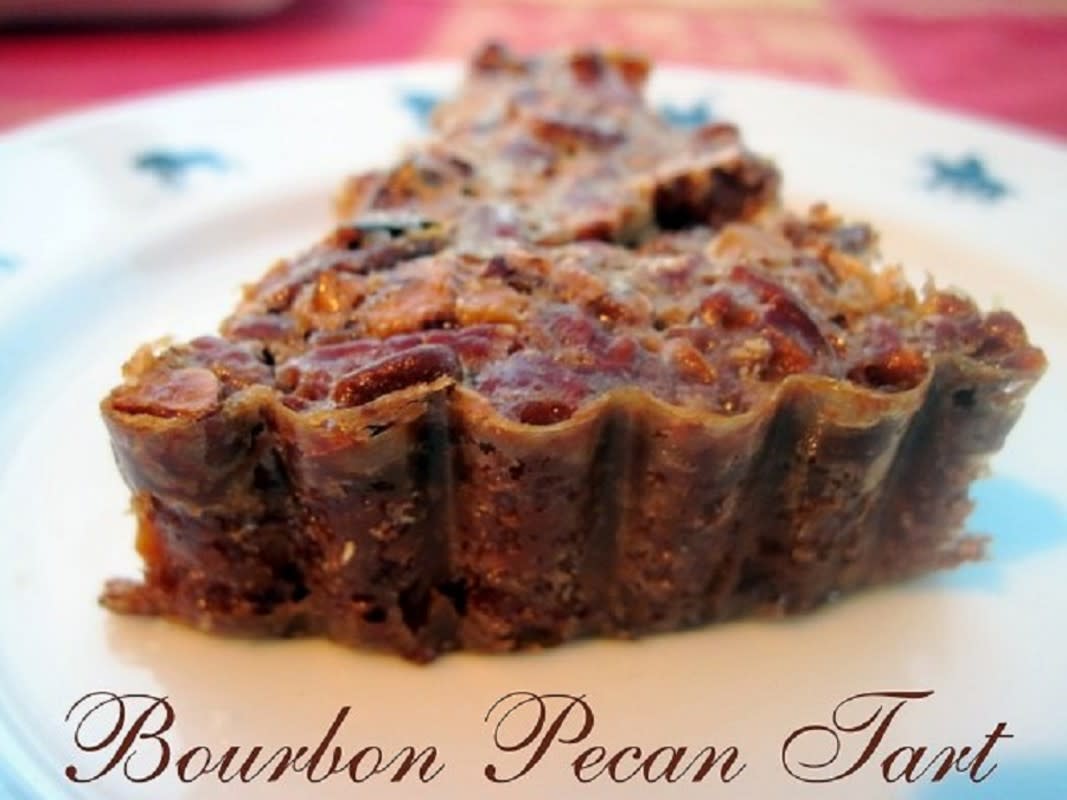 <p>Moore or Less Cooking</p><p>Incredibly delicious and a showstopper!</p><p><strong>G</strong><strong>et the recipe: </strong><a href="https://mooreorlesscooking.com/2013/12/pecan-and-bourbon-tart-and-a-600-visa-gift-card-holiday-giveaway/" rel="nofollow noopener" target="_blank" data-ylk="slk:Bourbon Pecan Tart;elm:context_link;itc:0;sec:content-canvas" class="link rapid-noclick-resp"><strong>Bourbon Pecan Tart</strong></a></p>