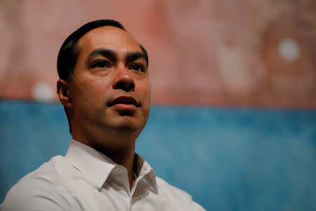 FILE PHOTO: U.S. 2020 Democratic presidential candidate Julian Castro listens as he is introduced at a gathering of Tri-City Young Democrats in Somersworth, New Hampshire, U.S., January 15, 2019. REUTERS/Brian Snyder/File Photo