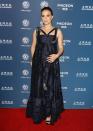 <p>The actress chose a navy blue brocade Erdem dress for an awards event in LA in mid-December. The full-length gown skimmed the star’s bump and featured embellishments and a cross-bodice design. [Photo: Getty] </p>