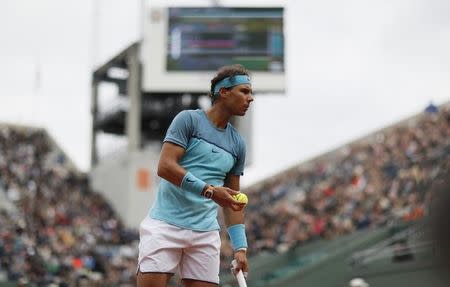 Tennis - French Open - Roland Garros - Rafael Nadal of Spain vs Sam Groth of Australia Paris, France - 24/05/16. Rafael Nadal of Spain reacts. REUTERS/Gonzalo Fuentes