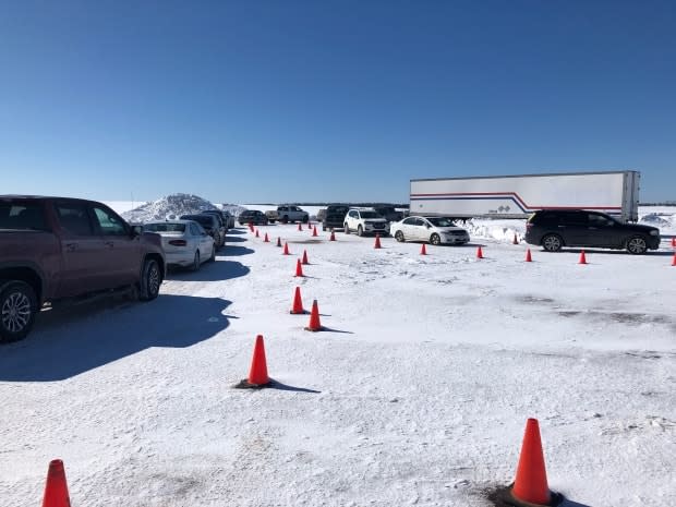 Drivers seeking COVID-19 tests in faced a long wait in line at the Slemon Park testing centre near Summerside Friday. (Brittany Spencer/CBC - image credit)