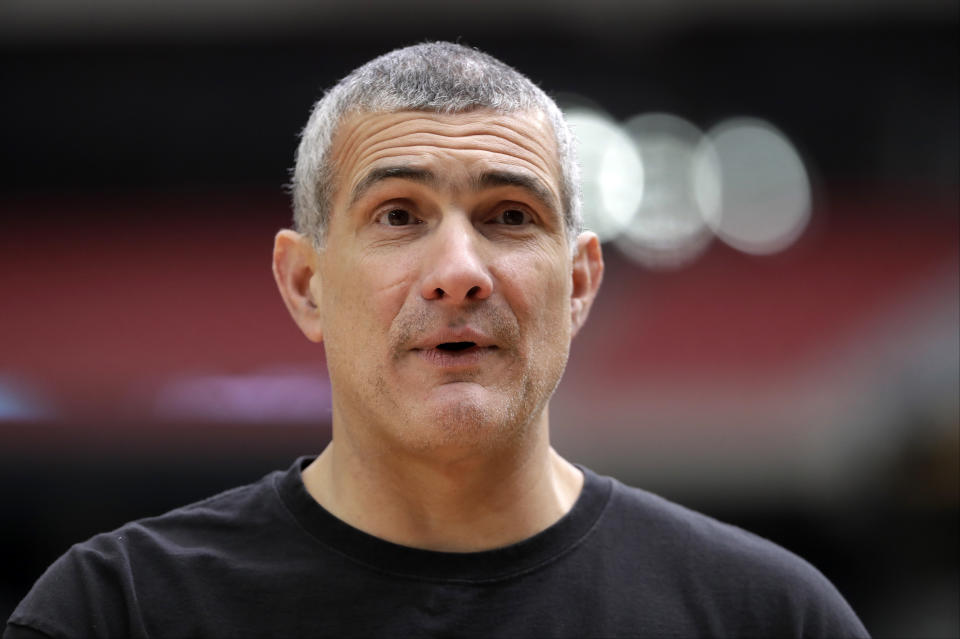 South Carolina head coach Frank Martin talks to his players during a practice session for their NCAA Final Four tournament college basketball semifinal game Friday, March 31, 2017, in Glendale, Ariz. (AP Photo/David J. Phillip)