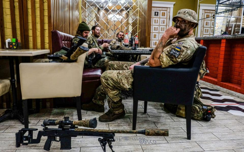 Special forces of the Ukrainian army having lunch in a restaurant in Bakhmut - Zuma Press / eyevine