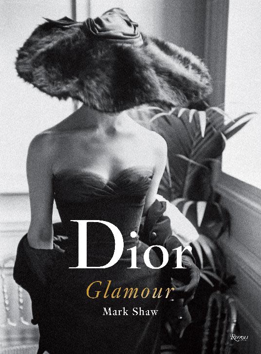 This book cover image released by Rizzoli shows "Dior Glamour: 1952-1962," by Natasha Fraser-Cavassoni. The holidays bring out the inner-coffee table book obsessive in gift buyers. They're easy, weighty and satisfying to give. (AP Photo/Rizzoli)