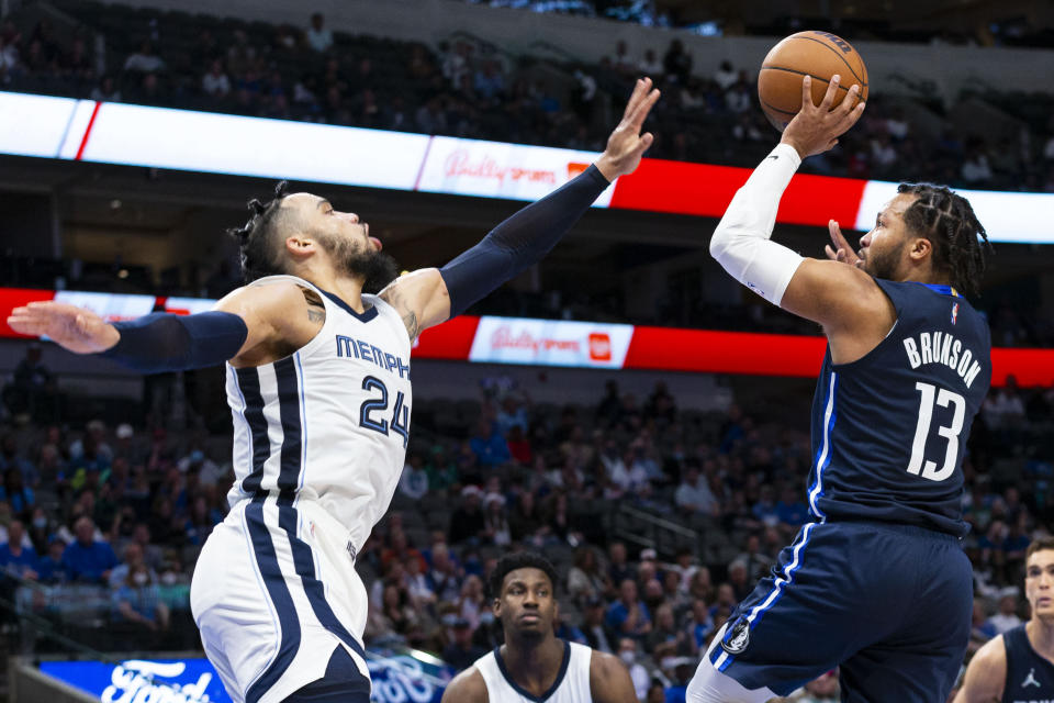 Dallas Mavericks guard Jalen Brunson (13) attempts to shoot as Memphis Grizzlies forward Dillon Brooks (24) defends during the second half of an NBA basketball game, Saturday, Dec. 4, 2021, in Dallas. (AP Photo/Sam Hodde)