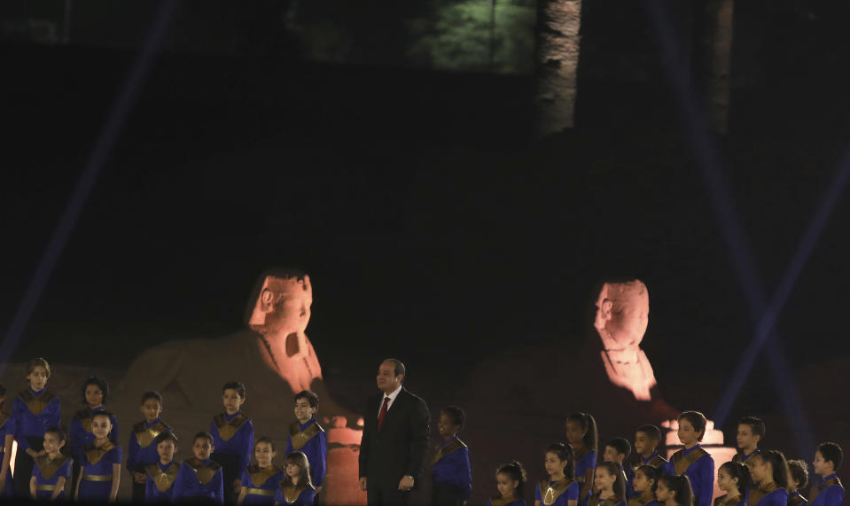 Egypt's President Abdel Fattah al-Sisi attends the official ceremony of the opening of the Avenue of Sphinxes commonly known as El Kebbash Road on Thursday, Nov. 25, 2021 in Luxor, Egypt. The ceremony was meant to highlight the country’s archaeological treasures as Egypt struggles to revive its tourism industry, battered by years of political turmoil and more lately, the coronavirus pandemic. (AP Photo/Mohamed El-Shahed)