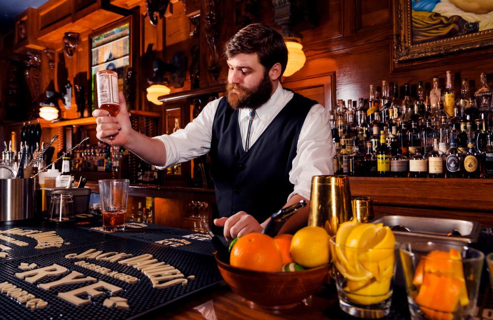 Bartender Morgan Johnson makes a Sazerac whiskey cocktail at McClintock Saloon and Chophouse located at 2227 Exchange Ave. in Oklahoma City Okla. on Friday, Jan. 18, 2019.  Photo by Chris Landsberger, The Oklahoman 