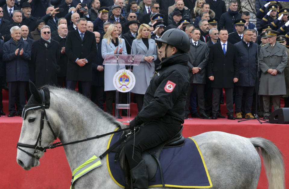 A police officer of Republic of Srpska rides his horse during a parade marking the 30th anniversary of the Republic of Srpska in Banja Luka, northern Bosnia, Sunday, Jan. 9, 2022. This week Bosnian Serb political leader Milorad Dodik was slapped with new U.S. sanctions for alleged corruption. Dodik maintains the West is punishing him for championing the rights of ethnic Serbs in Bosnia — a dysfunctional country of 3.3 million that's never truly recovered from a fratricidal war in the 1990s that became a byname for ethnic cleansing and genocide. (AP Photo/Radivoje Pavicic)