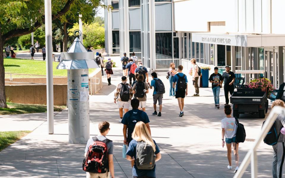 Students walk across the CSU Pueblo campus