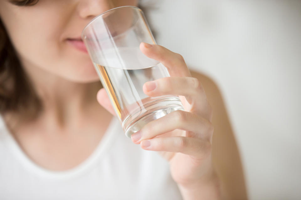 <p>Dehydration can often be confused with hunger. Simply drinking two glasses of water can help indicate if you are in fact hungry. If after half an hour you still feel peckish, it’s time to prep your dinner. <em>[Photo: Getty]</em> </p>