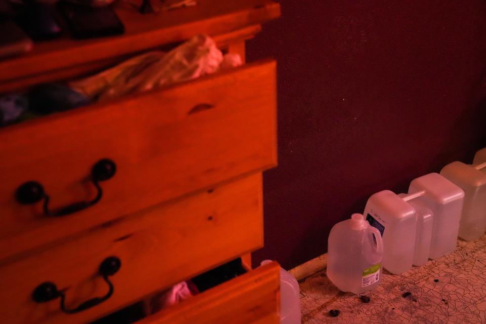 Emergency water is stored inside Pam Wiedman's bedroom at her home in Mesa.