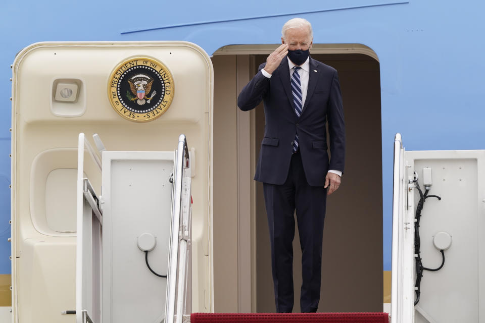 President Joe Biden salutes from the top of the steps of Air Force One at Andrews Air Force Base, Md., Tuesday, March 16, 2021, as he prepares to depart for a trip to Pennsylvania. (AP Photo/Susan Walsh)