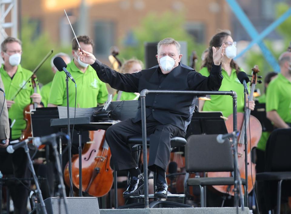 Tulsa Symphony Orchestra's guest conductor Gerhardt Zimmermann is shown before the performance of Beethoven's Ninth Symphony at ONEOK Field in 2021. The performance was part of a Tusla Drillers minor league baseball game.