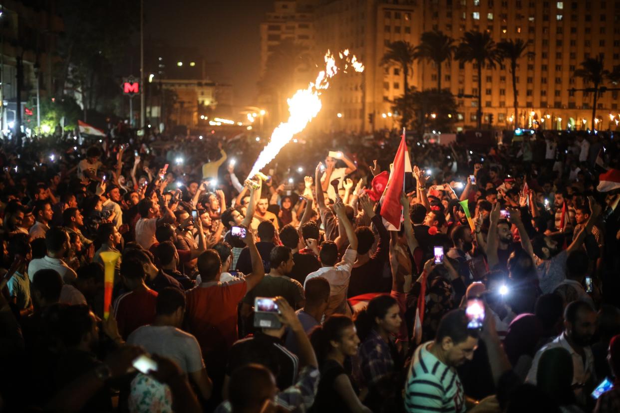 Egypt fans celebrate in Cairo after their national team qualified for the World Cup. (Getty)