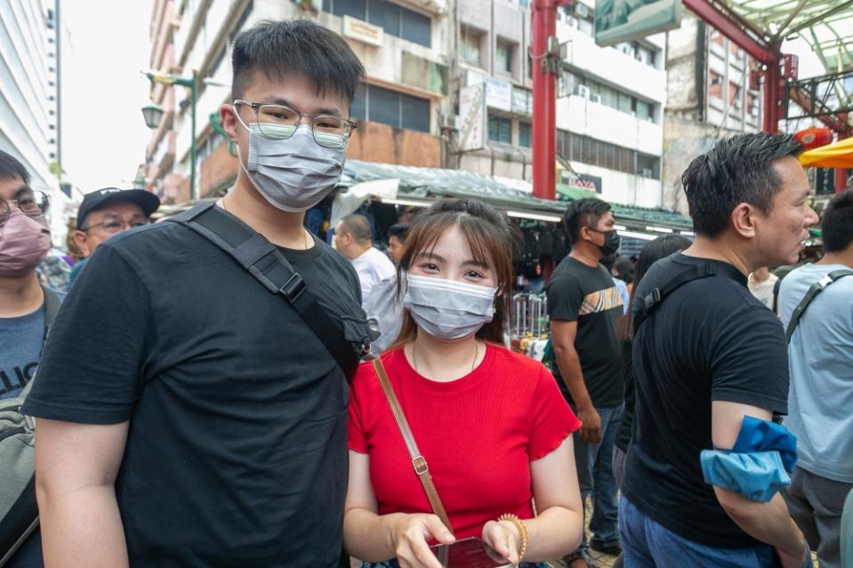 Yeok Tzong, 26, and his wife Claire Leong, 26, are seen at Petaling Street during the extended holiday for Hari Raya Aidilfitri April 24, 2023. — Picture by Raymond Manuel