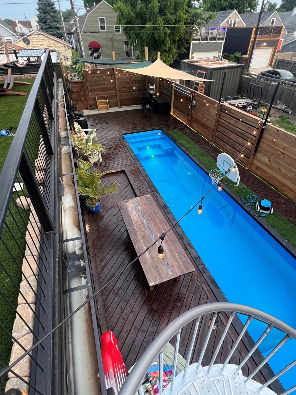 Drew Butterworth's home made of shipping containers includes a pool, deck and second floor balcony