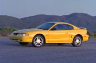 <p>The fourth-generation Ford Mustang finally made its debut in <strong>late 1993</strong>. Its softer, more rounded design subtly borrowed styling cues like the scoops behind the doors and the distinctive shape of the rear lights from the Mach III concept but it looked considerably less futuristic – and, thankfully, much lower to the ground.</p><p>It marked a <strong>significant step forward</strong> from the third-generation car in terms of style, substance and power, however.</p>