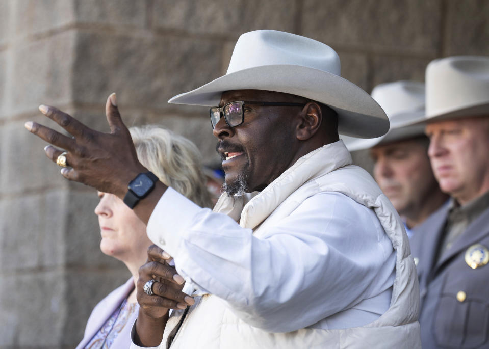 Polk County Sheriff Bryon Lyons speaks as he and other law enforcement officials announce Tuesday, Feb. 20, 2024, in Livingston, Texas, that the body of 11-year-old Audrii Cunningham had been found in the Trinity River near her home. (Jason Fochtman/Houston Chronicle via AP)