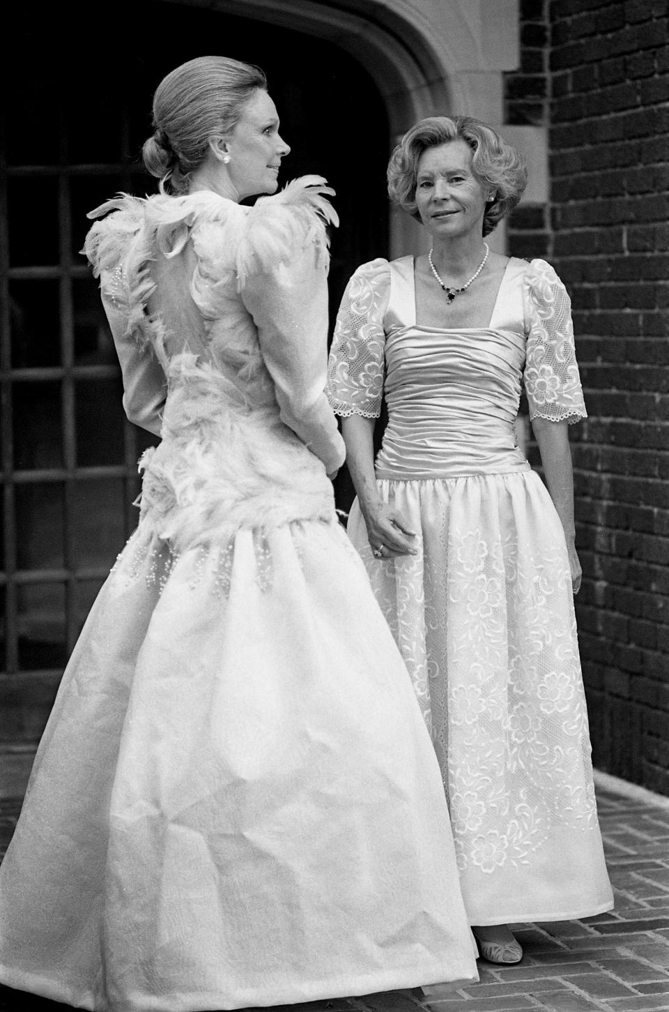 Showing off their gowns on June 5, 1985, for the upcoming annual Swan Ball, Clare Armistead, left, had her dress designed by Alfred Fiandaca, while Roberta Lochte chose Nashville designer Linda Rhea.