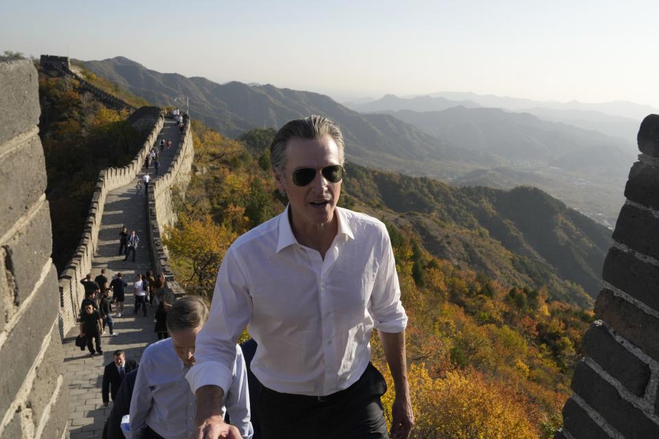 California Gov. Gavin Newsom walks up a section of the Mutianyu Great Wall on the outskirts of Beijing, Thursday, Oct. 26, 2023. Newsom is on a weeklong tour of China where he is pushing for climate cooperation. His trip as governor, once considered routine, is drawing attention as it comes after years of heightening tensions between the U.S. and China. | Ng Han Guan, Associated Press