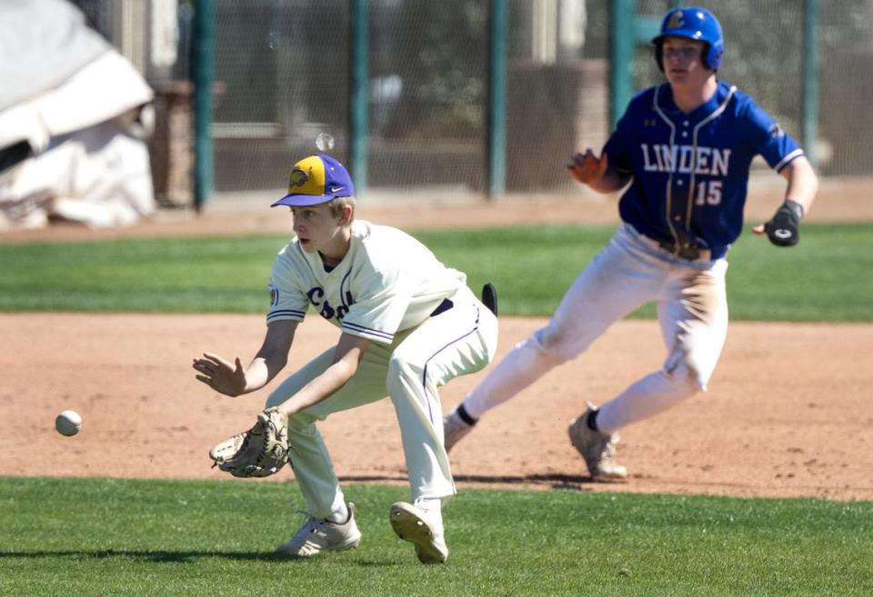 Escalon’s Josh Fiori fields a ground ball during the Modesto Nuts High School Baseball Showcase game with Linden at John Thurman Field in Modesto, Calif., Saturday, March 16, 2024. Linden won the game 11-8.