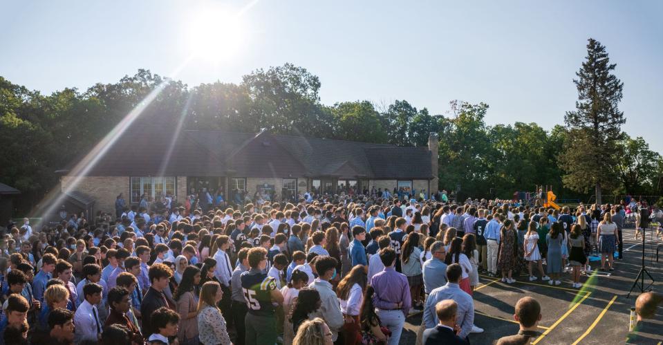 Brookfield Academy students, teachers and alumni gather for the school's Founders Day ceremony in September to celebrate the 50th anniversary of the first graduating class of 1971.