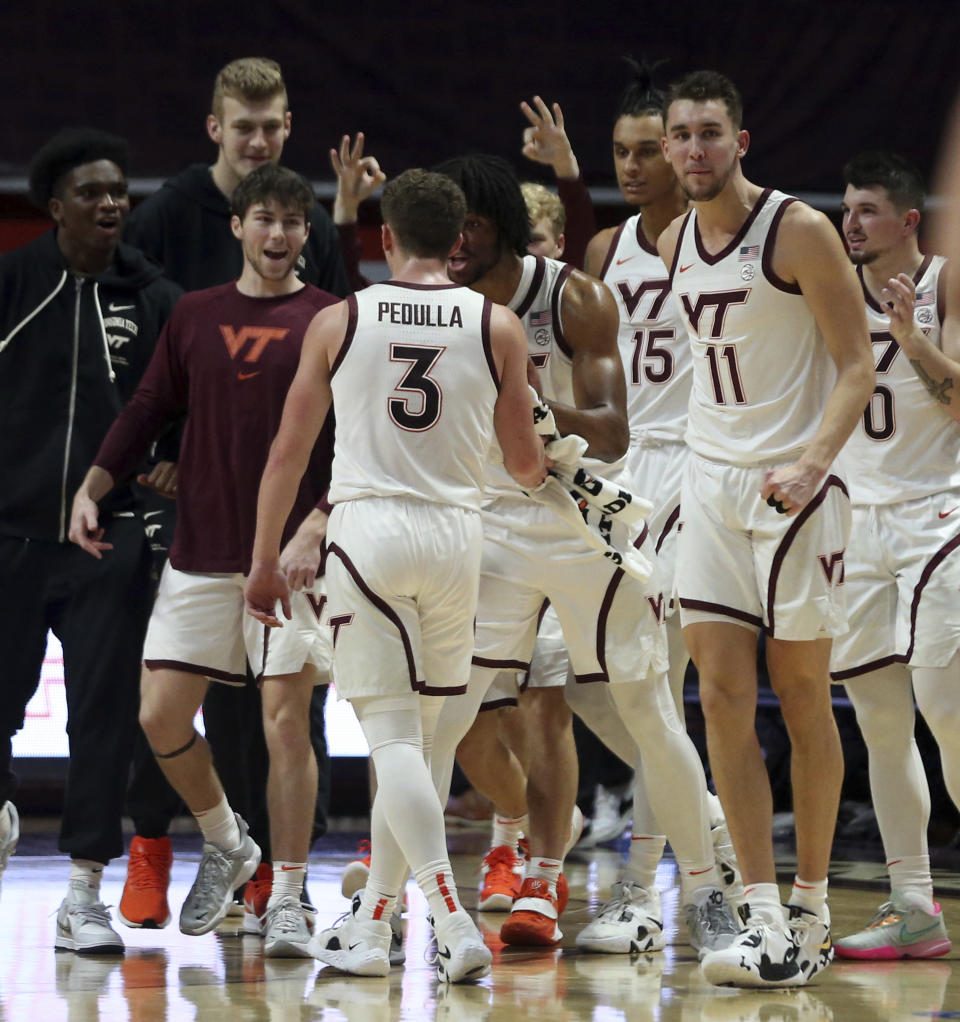 Virginia Tech's Sean Pedulla (3) is congratulated after making a 3-point basket against Lehigh during the first half of an NCAA college basketball game Thursday, Nov. 10, 2022, in Blacksburg, Va. (Matt Gentry/The Roanoke Times via AP)