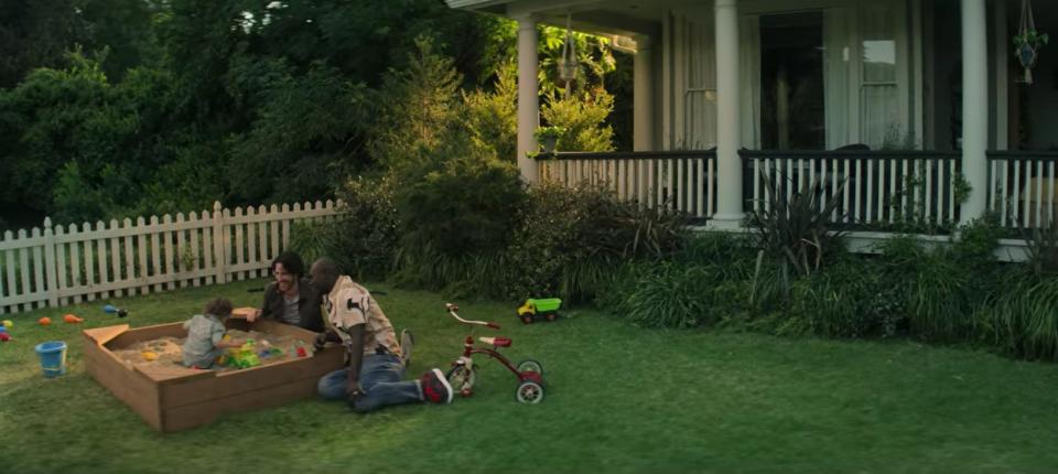 Henry with Dante and his husband in the front yard playing  - You season 3