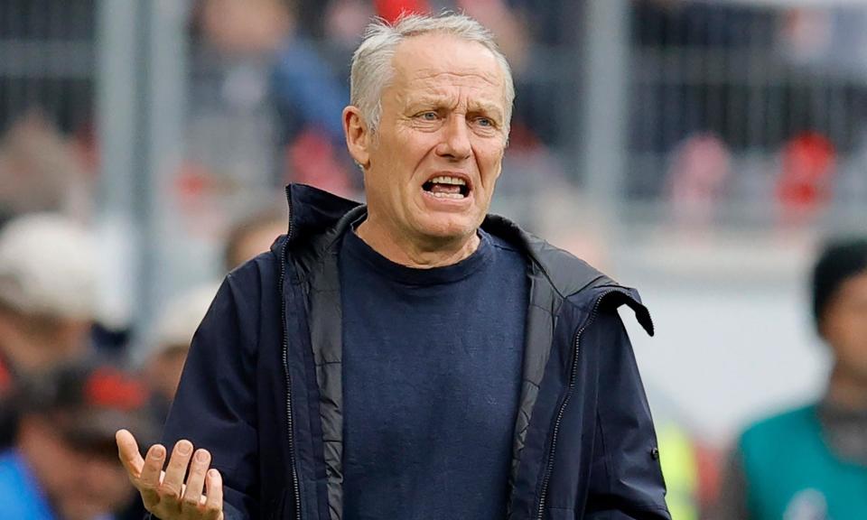 <span>Christian Streich announced he will leave in the summer a day after the 3-2 defeat at home by the league leaders, Bayer Leverkusen.</span><span>Photograph: Ronald Wittek/EPA</span>