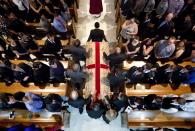 <p>The procession with the casket of Christopher Andrew Leinonen, one of the victims of the Pulse nightclub mass shooting, enters the Cathedral Church of St. Luke for his funeral service Saturday, June 18, 2016, in Orlando. Fla. (AP Photo/David Goldman) </p>