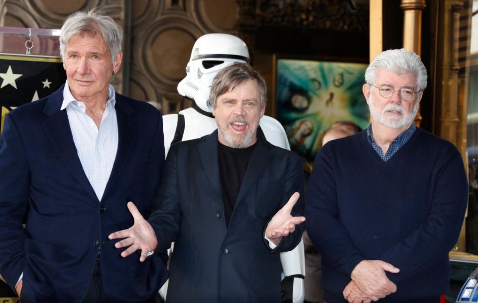 George Lucas with Harrison Ford and Mark Hamill at Hamill’s Hollywood Walk of Fame ceremony in March 2018. EPA