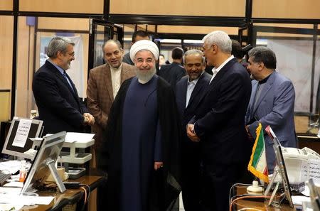 Iran's President Hassan Rouhani visits the election office in Tehran, Iran, May 19, 2017. Picture taken May 19, 2017. President.ir/Handout via REUTERS