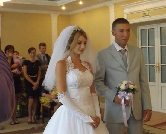 Alexander Yakunin, 30, and his 25-year-old wife Viktoria on their wedding day.