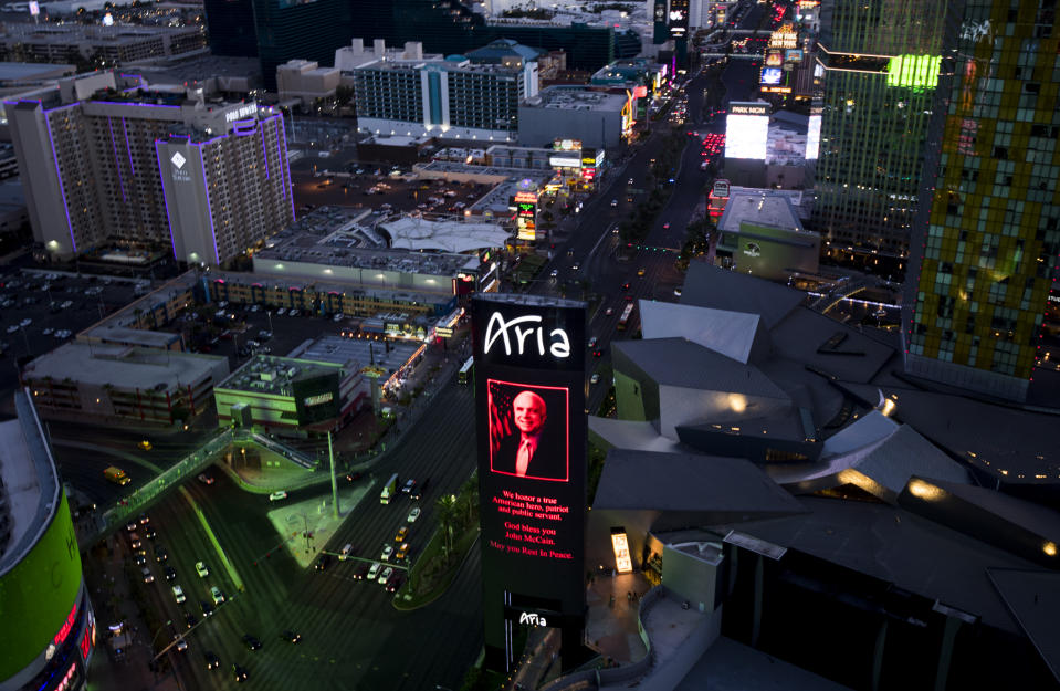 <p>The Aria Resort and Casino sign honors Sen. John McCain on the Strip in Las Vegas, Nev., on Monday, Aug. 27, 2018. Sen. McCain died frmo brain cancer over the weekend. (Photo: Bill Clark/CQ Roll Call/Getty Images) </p>