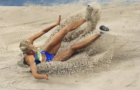 2016 Rio Olympics - Athletics - Preliminary - Women's Long Jump Qualifying Round - Groups - Olympic Stadium - Rio de Janeiro, Brazil - 16/08/2016. Darya Klishina (RUS) of Russia competes. REUTERS/Dominic Ebenbichler