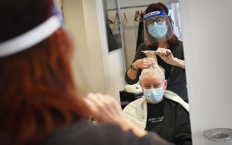 Salons and hairdressers have experienced a surge in bookings before the second lockdown comes into force on Thursday - Paul Ellis/AFP