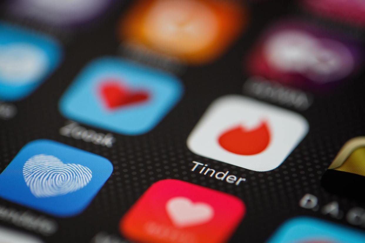 The "Tinder" app logo is seen amongst other dating apps on a mobile phone screen on November 24, 2016 in London, England: Getty Images