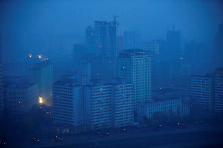 Military trucks drive through central Pyongyang before sunset as the capital preparers for a parade marking today's 105th anniversary of the birth of Kim Il Sung, North Korea's founding father and grandfather of the current ruler, April 15, 2017. REUTERS/Damir Sagolj