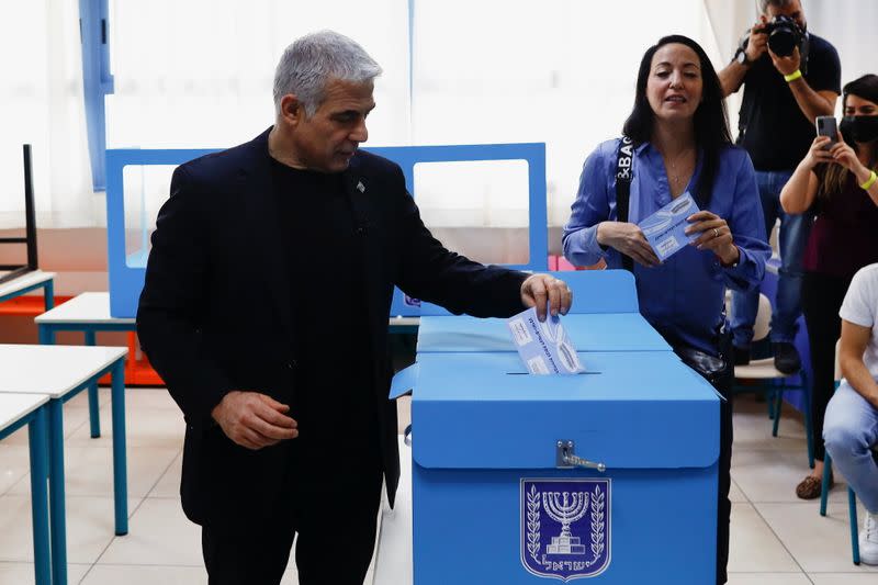 Yair Lapid, leader of Yesh Atid party, casts his ballot in Israel's general election, at a polling station in Tel Aviv