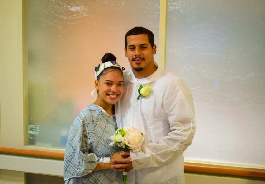 Shantel and Jamison Espaillat were all smiles as they wed in their hospital attire at Manhattan' Mount Sianai. (Photo: Tom Denaro/The New York Post)