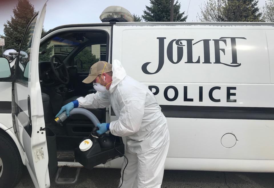 About 100 Joliet squad cars are being sanitized to ward off the new coronavirus thanks to donations from two small Joliet businesses. Image via John Ferak/Patch