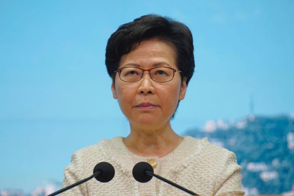 Hong Kong Chief Executive Carrie Lam listens to reporters' questions during a press conference in Hong Kong, Tuesday, July 7, 2020. TikTok said Tuesday it will stop operations in Hong Kong, joining other social media companies in warily eyeing ramifications of a sweeping national security law that took effect last week.(AP Photo/Vincent Yu)