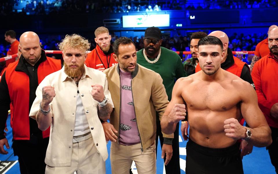 Jake Paul and Tommy Fury pose after a face-off in the ring at the OVO Arena Wembley, London. Picture date: Saturday January 28, 2023.
