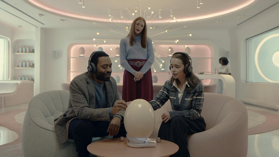 This image released by the Sundance Institute shows Chiwetal Ejiofor, from left, Rosalie Craig and Emilia Clarke appear in a scene from "The Pod Generation," a film by Sophie Barthes, an official selection of the Premieres program at the 2023 Sundance Film Festival. (Andrij Parekh/Sundance Institute via AP)