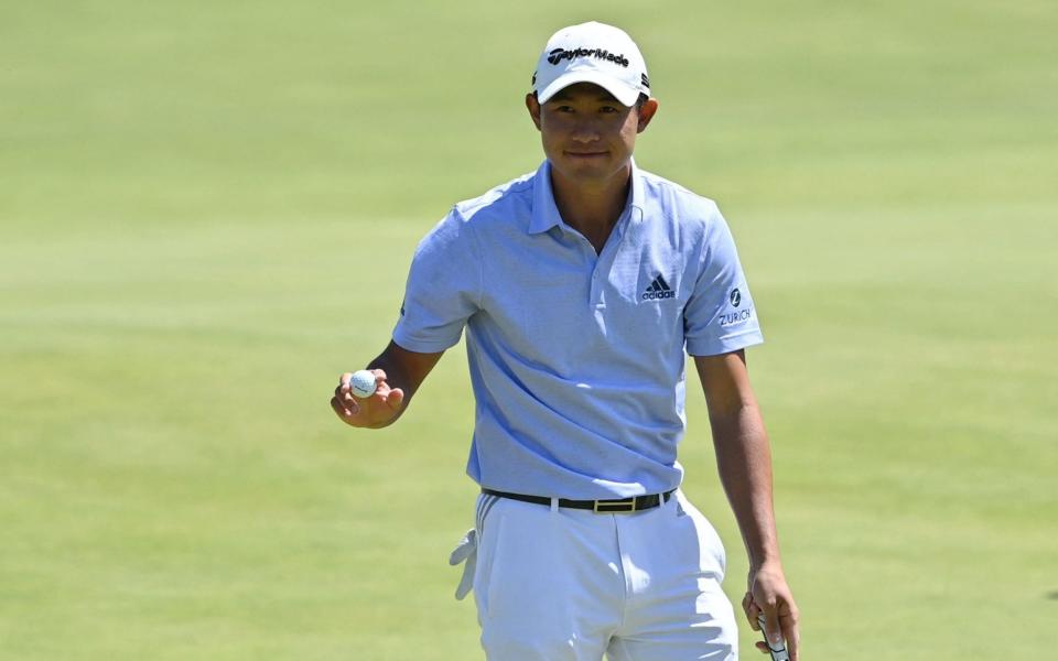 US golfer Collin Morikawa reacts after finishing his second round on day 2 of The 149th British Open Golf Championship at Royal St George's, Sandwich in south-east England on July 16, 2021.  - AFP