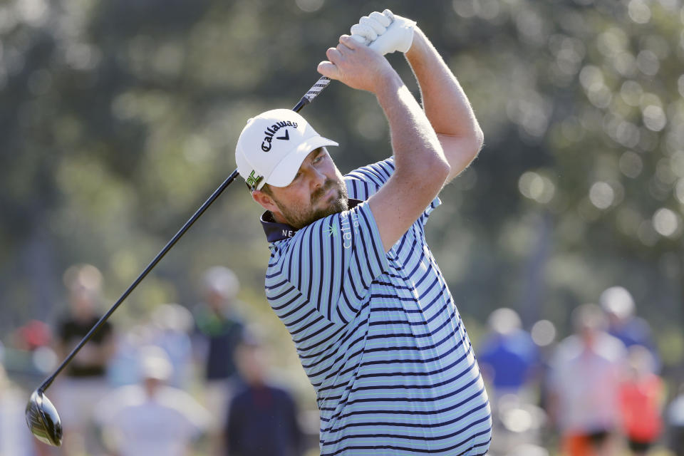 Marc Leishman tees off on the 16th hole during the first round of the Houston Open golf tournament Thursday, Nov. 11, 2021, in Houston. (AP Photo/Michael Wyke)