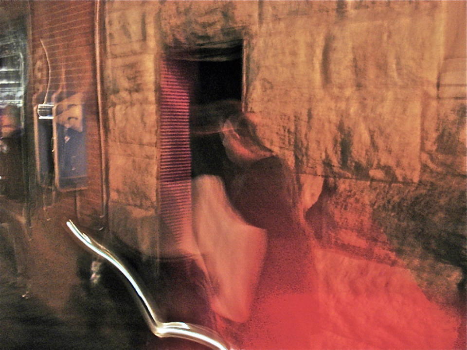 This recent image, taken by Bret and Gina Oldham, shows two ghostly figures in an area of Nashville known as Printers Alley. In the foreground is a figure of a large woman in a long dress and her hair pulled back. And in front of this "spirit," the figure of a man appears to be standing against a building wall.