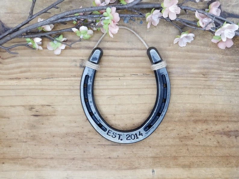 <p><a href="https://go.redirectingat.com?id=74968X1596630&url=https%3A%2F%2Fwww.etsy.com%2Flisting%2F780269832%2Fengraved-horseshoe-customized-western&sref=https%3A%2F%2Fwww.thepioneerwoman.com%2Fholidays-celebrations%2Fgifts%2Fg36187954%2Fcowboy-gifts%2F" rel="nofollow noopener" target="_blank" data-ylk="slk:Shop Now;elm:context_link;itc:0;sec:content-canvas" class="link ">Shop Now</a></p><p>Engraved Horseshoe</p><p>etsy.com</p><p>$25.95</p><span class="copyright">Etsy/TysCountryCreations</span>